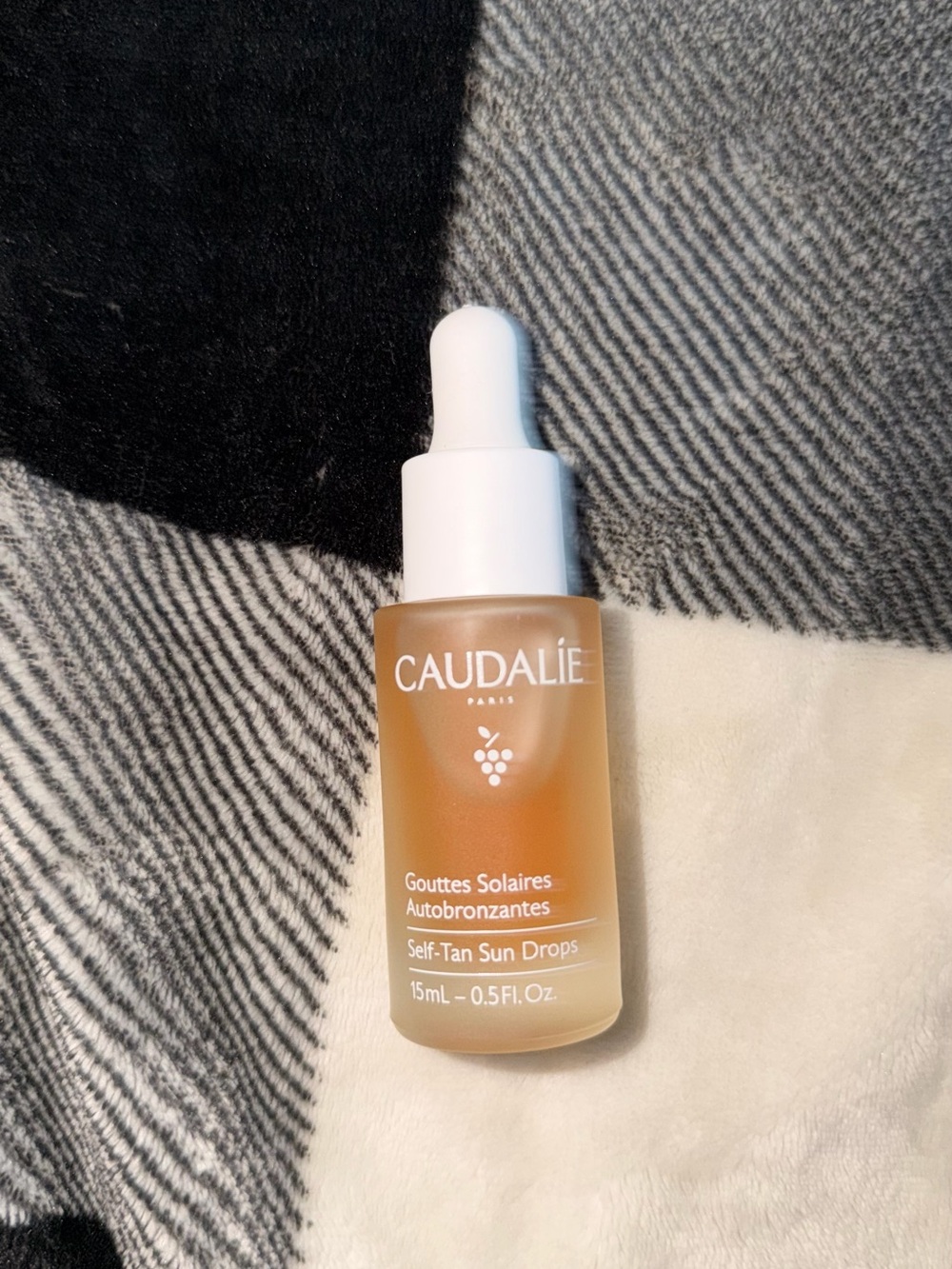 Caudalie Self-Tan Sun Drops — amber tan with white dropper